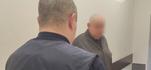 Забирал телефоны: еще один работник морга на Харьковщине обворовывал погибших украинских военных